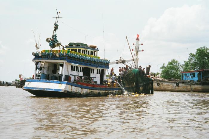 Fishermen Cleaning Nets (Mekong River)