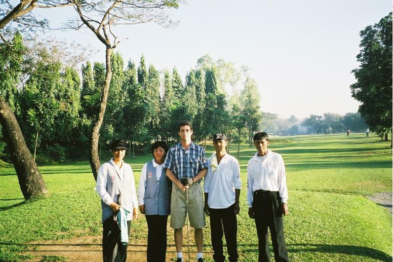 Craig With The Caddies And "Umbrella Women"