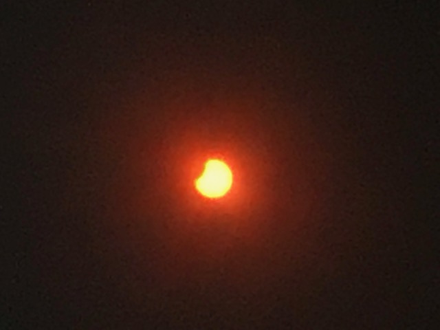 Eclipse Through Solar Glasses - Start